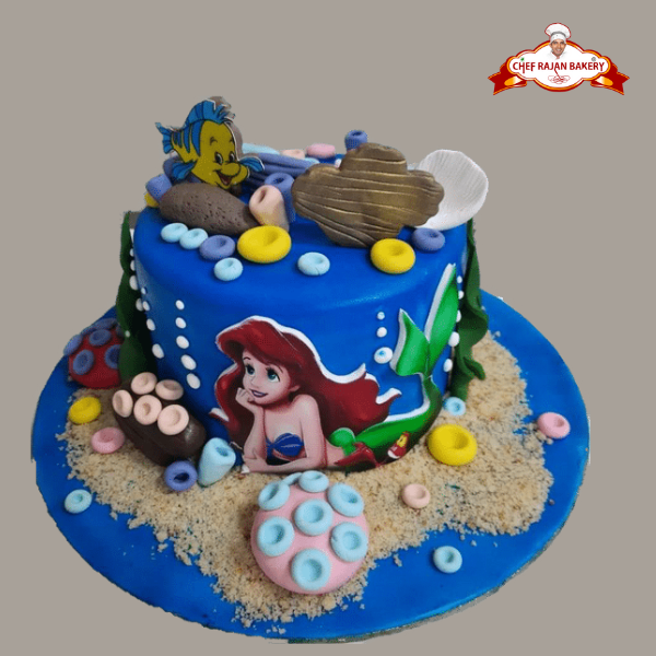 Made this mermaid 2 tier cake with sugarpaste giant seashell and edible  image topper. | Tiered cakes birthday, 2 tier birthday cakes, Mermaid cakes