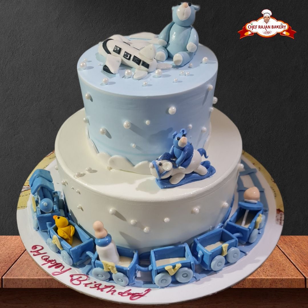 Teddy christening cake decorated... - The Golden Cake Co. | Facebook